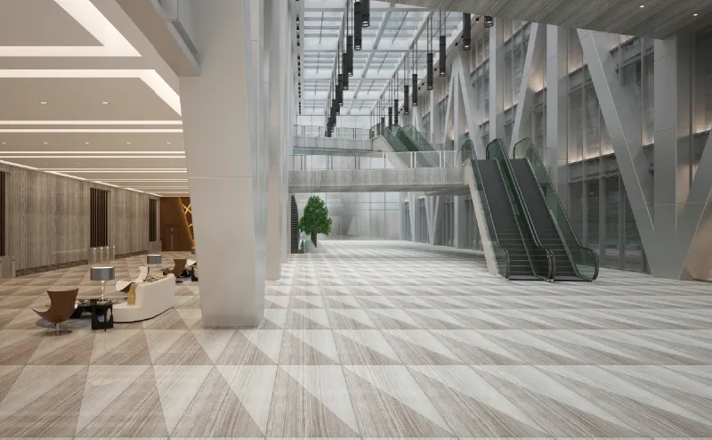 Photo of a building with an escalator and a tile floor