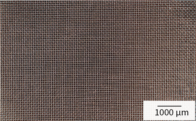 Magnified photograph of metal mesh for electrode (W62/63)
