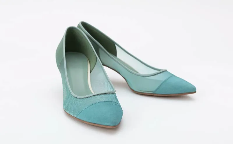 Photo of turquoise blue pumps made from mesh material