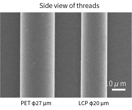 Side view photo of PET and LCP filaments, with diameters of 27µm and 20µm respectively